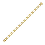 Gold horseshoe and diamond bracelet on a white background