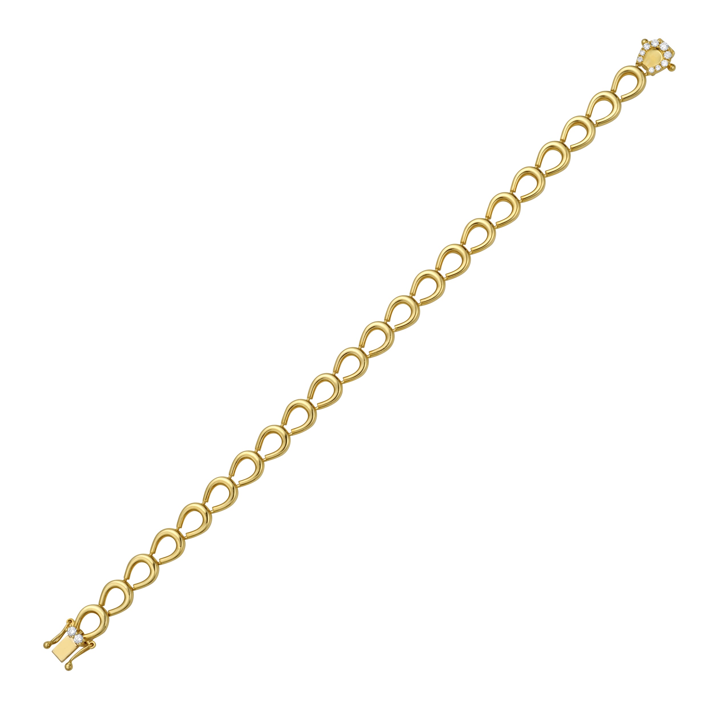 Gold horseshoe and diamond bracelet on a white background