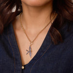 Sapphire wings of love charm on a rolo chain