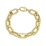 A bold statement bracelet crafted in chunky gold links with a high-polish finish and classic lobster clasp closure. Handcrafted in Italy