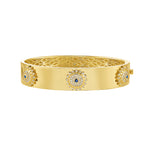 Lionheart Soraya evil eye diamond bangle in 14K gold with sapphire center and full diamond halo — protective cuff bracelet