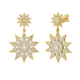 Gold star-shaped earrings with diamonds on a white background