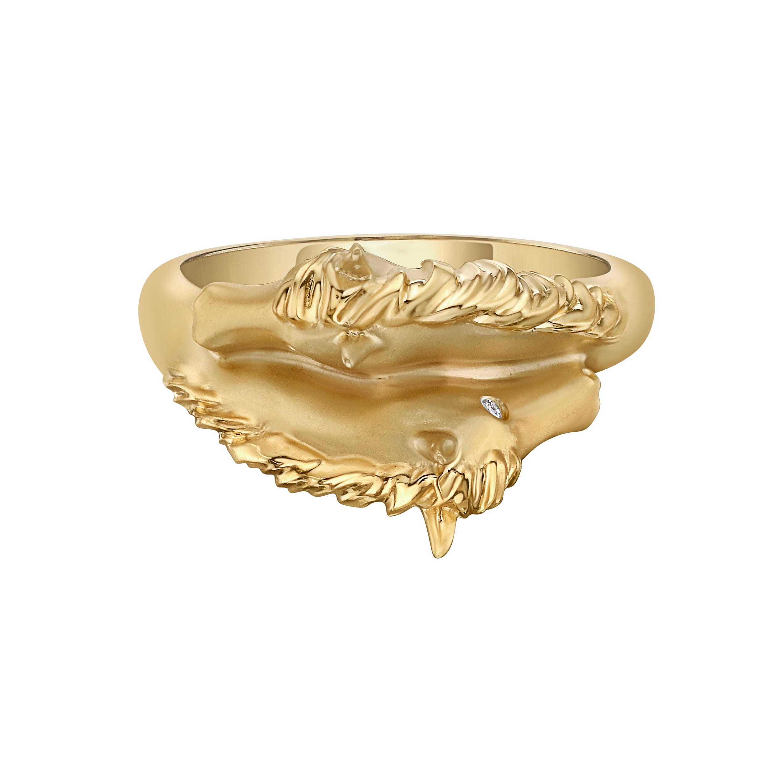 Gold ring with intricate horse design on a white background