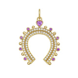 Gold horseshoe-shaped charm with gemstones and diamonds on a white background
