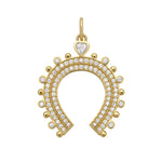 Gold horseshoe-shaped charm with gemstones and diamonds on a white background
