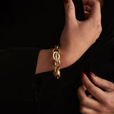 Gisele Specialty Satin And Polished Knot Link Bracelet