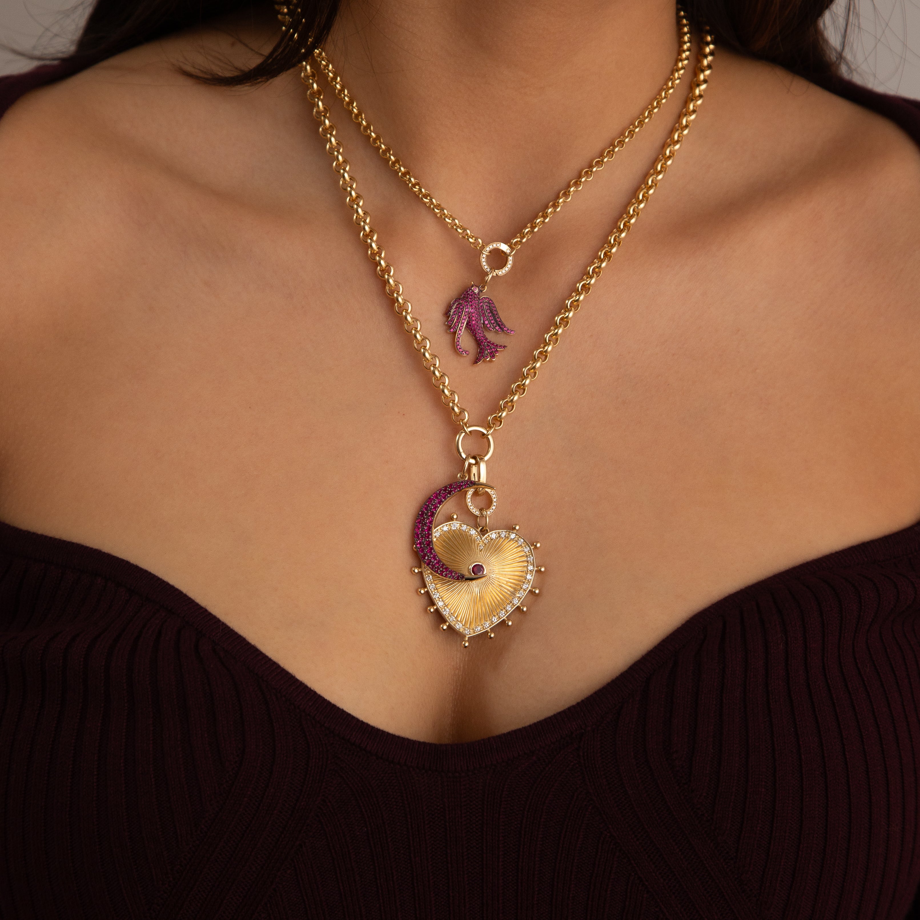 Model wearing ruby crescent moon charm necklace in 14K gold