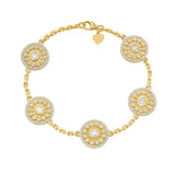 Close-up of the Diamond Serenity Charm Bracelet by Lionheart, featuring five sparkling diamond amulet charms on a delicate 14K gold chain.