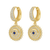 Lionheart Soraya evil eye dangle earrings in 14K gold with sapphire & diamonds — symbolic protective drop earrings