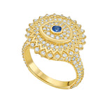 Lionheart Soraya evil eye signet ring in 14K gold with sapphire center and diamonds — protective statement ring