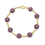 Lumiere gold star bracelet with rubies and diamonds by Lionheart Jewelry