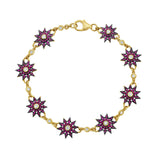 Lumiere gold star bracelet with rubies and diamonds by Lionheart Jewelry